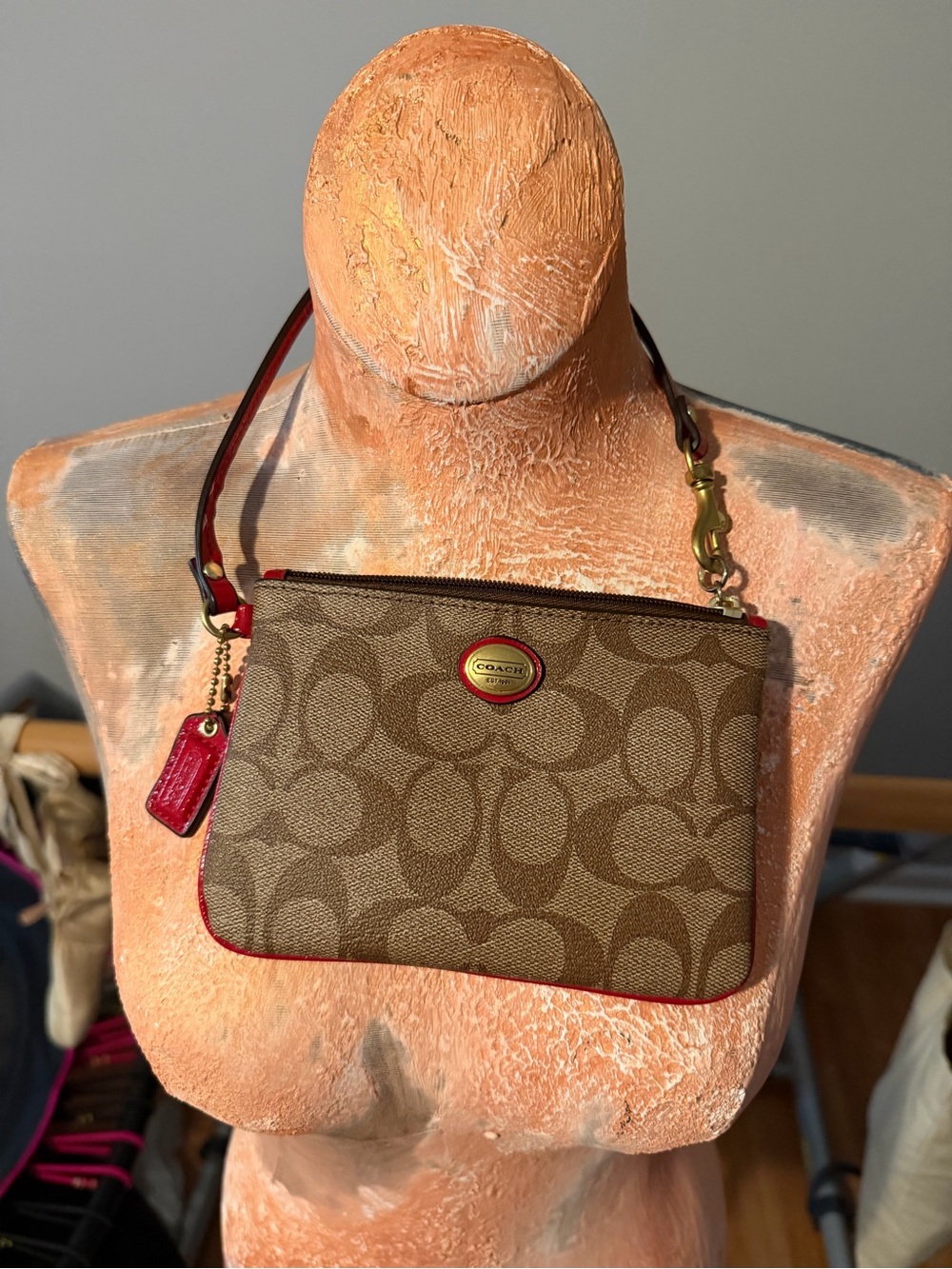 Coach wristlet brown red gold
